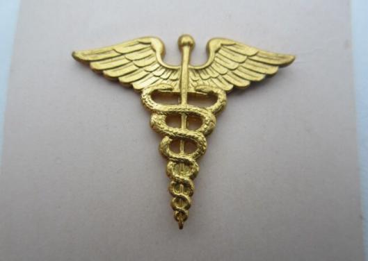 IMCS Militaria | 3 US WW2 Medical Unifom and Cap Insignia