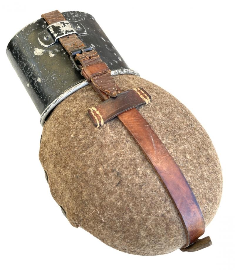 Wehrmacht M31 Canteen with brown leather straps