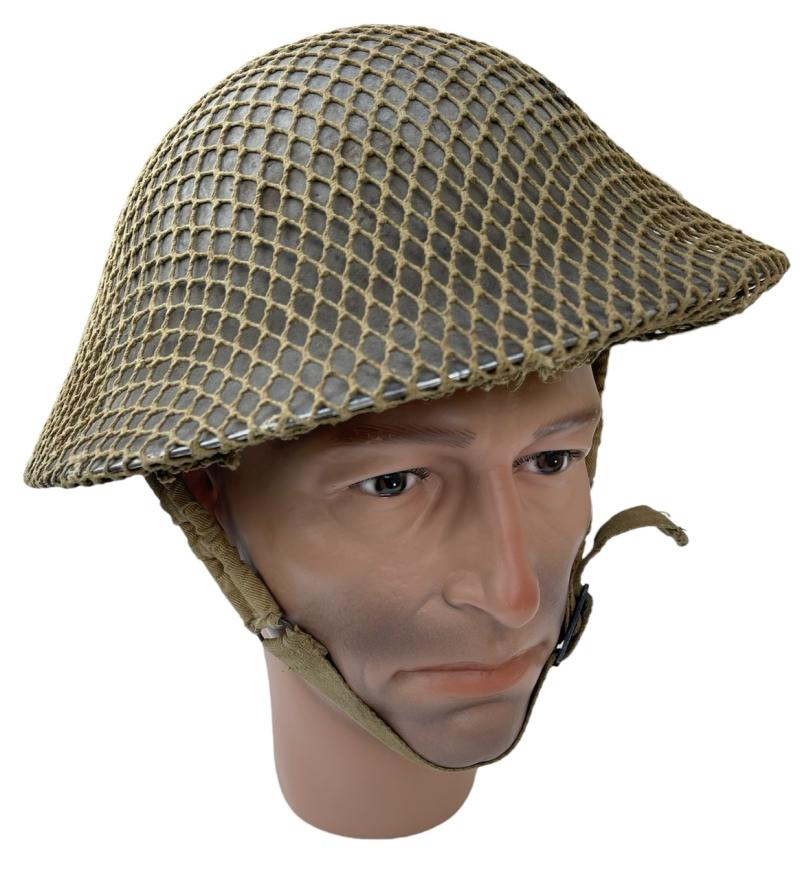 British WW2 Brodie type Helmet with camo net