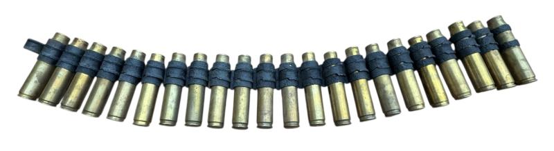 22 British WW2 20mm Canon Casings in Belt Links