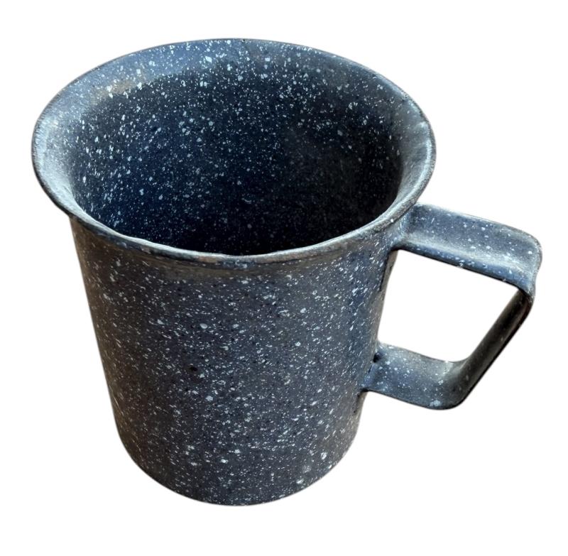 Metal and enameled mugs made from 7,5 cm KwK Shell.