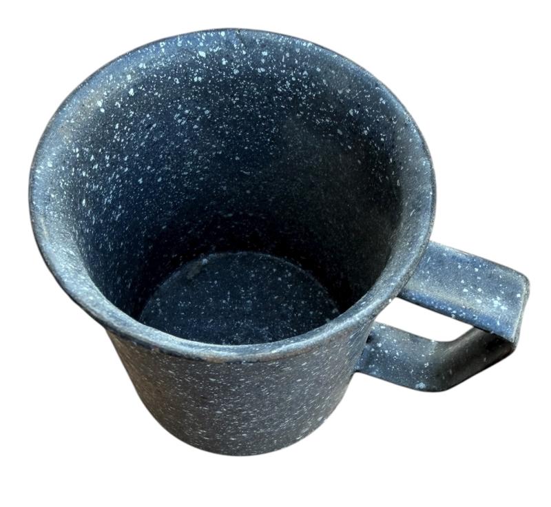 Metal and enameled mugs made from 7,5 cm KwK Shell.