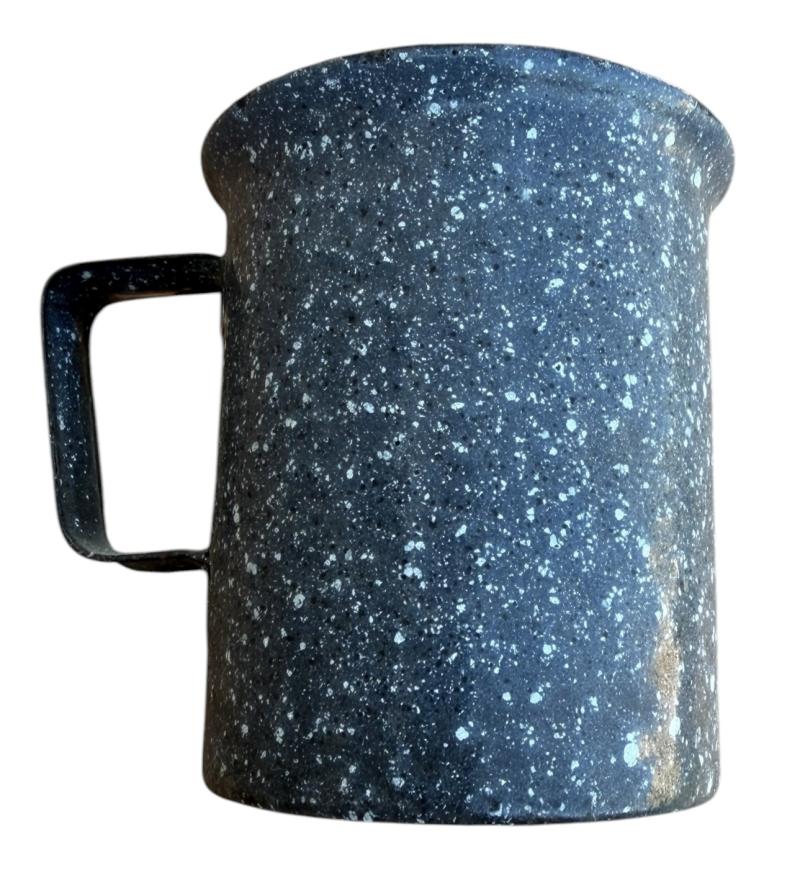 Metal and enameled mugs made from 7,5 cm KwK Shell.