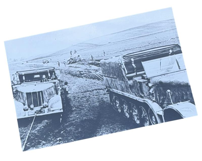Very nice photograph of 2 Wehrmacht Tracked Vehikels towing a Panther Tank
